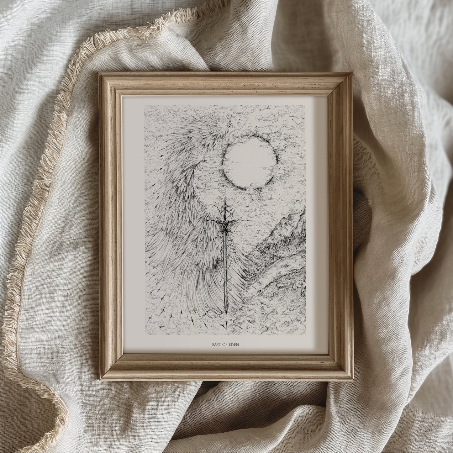 Highly detailed black and white fantasy illustration of a vertical sword entwined with wings, dividing a surreal sky, sun, and mountainous landscape. Hand-drawn in fine ink lines, evoking mythic and celestial themes with gothic and ethereal elements.